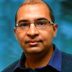 srinivasan-blue background