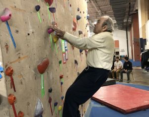 Michael Cohen climbing at age 89.