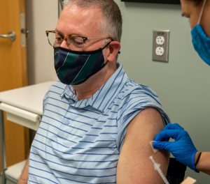 Man receives vaccine