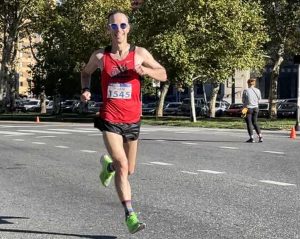 Adam Cohen running in a race