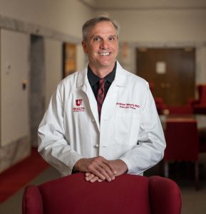 Dr. Andrew Weyrich poses for a portrait