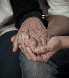 Mother and daughter holding hands